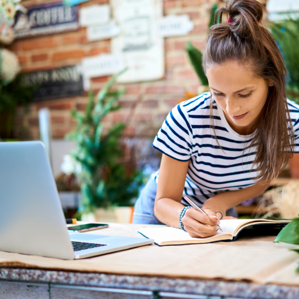 image of girl on computer looking ahead to new 2025 webinars and resources